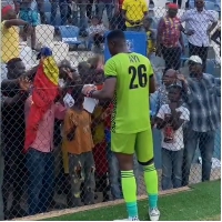 Goalkeeper Richmond Ayi apologizing to fans after the game