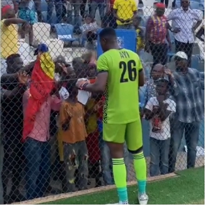 Goalkeeper Richmond Ayi apologizing to fans after the game