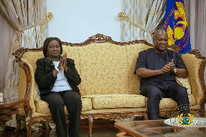 President John Dramani Mahama seated with Prof Opoku-Agyemang