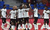 Jordan Ayew (C) celebrates with teammates after scoring a goal during the 2017 AFCON quarter-final