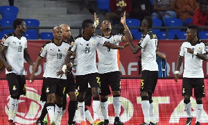 Jordan Ayew (C) celebrates with teammates after scoring a goal during the 2017 AFCON quarter-final