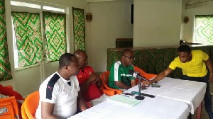 Hon Asiamah (centre) reached a deal with the players in Gabon