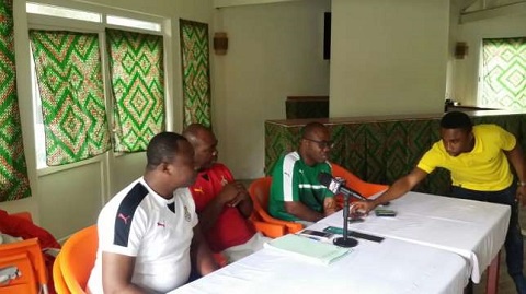 Hon Asiamah (centre) reached a deal with the players in Gabon