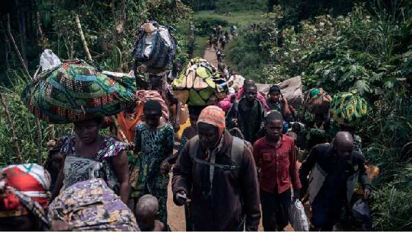 Residents of Bambo in Rutshuru territory Eastern DRC flee as the M23 attacked the town