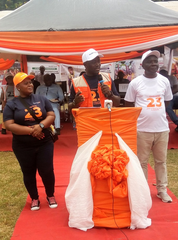 Joshua Baidoo  (middle) addresses the achievements of the organisation