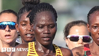 Rebecca Cheptegei  (middle)