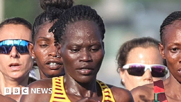 Rebecca Cheptegei  (middle)