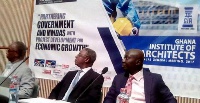 Atta Kyei (right) followed by Mr Joseph Hayford seated at the AGM