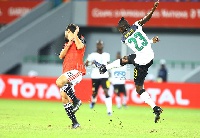 Ghana defender Harrison Afful clearing a ball during the 2017 AFCON Group D clash with Egypt