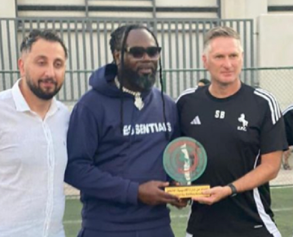 Prince Tagoe (in black attire) with Al Ettifaq FC officials