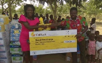 Francis Ocloo (right) making the donation