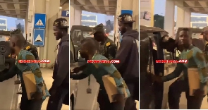 Screenshot of video of artiste being led out of airport