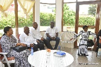 Akufo-Addo interacting with the Agyeman family
