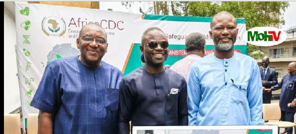 Minister of Health, Kwabena Mintah Akandoh (M) with other health officials