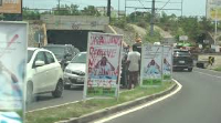 Outdoor advertisers has urged the government to halt median sign demolitions