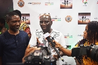 Socrate Safo (middle) speaking to the media at the screening. Animator Michael Tettey Narh (left)