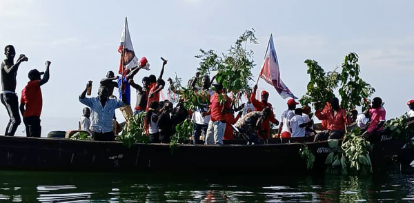 NUP supporters in a boat procession for a Kalangala District Woman MP candidate's campaign rally