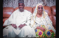 Haruna Iddrisu seated with his late mother Hajia Mariama