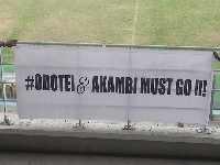 A poster calling for the resignation of Odotei and Ankabi