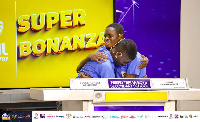 The PRESEC boys embracing themselves after winning the contest