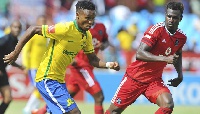 Themba Zwane of Mamelodi Sundowns challenged by Edwin Gyimah during Absa Premier/ BackpagePix