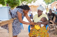 Dufe Dodzi recieves his childhood immunization during a catchup outreach