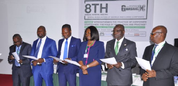 New members of Savings and Loans Association taking the Oath of Office