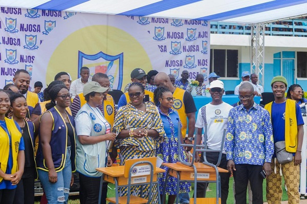 Members of Lions International, together with the staff of New Juaben SHS