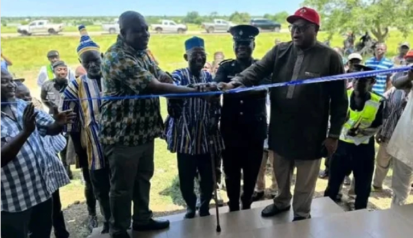 Photo of a tape cutting ceremony of a police post at Kokoligu