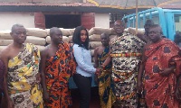 Mavis Nkansah Boadu Afigya, Sekyere East MP, donating the cement bags to some beneficiary Chieves
