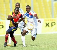 Liberty Professionals youngster, Gerald Arkson in action against Hearts