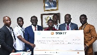 Dr Addo Kufuor with the 2018 winners of the National Science and Maths Quiz