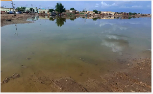 Floodwaters spread across a valley near the city of Abu Hamdan in the Northern state, Sudan, on Augu