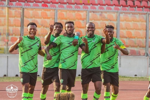 Dreams FC players in celebration