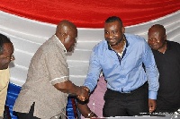 Nana Akufo-Addo with Chairman Wontumi in a handshake at an NPP function
