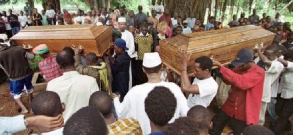 Flag-clad coffins holding the seven bodies headed towards the Festival square for burial