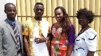 Banahene with his new bride flanked by family members