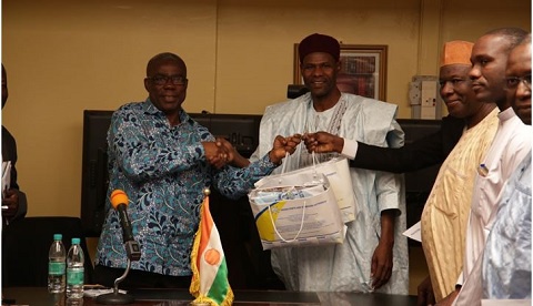 Peter Mac Manu captured in a photograph with some ministers of Niger