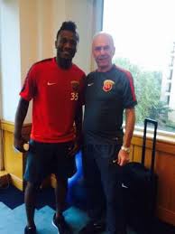 Asamoah with coach, Sven Eriksson
