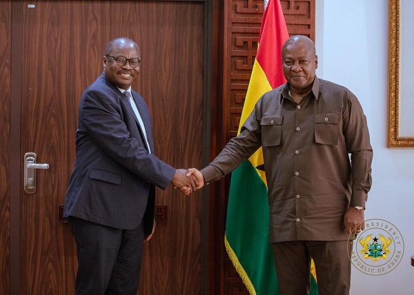 Dr. Ernest Addison and President John Dramani Mahama