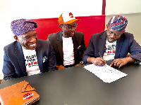 Founder of PKO Group  Dr Edward Osei (M)  and Gloves for Africa officials