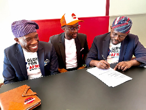 Founder of PKO Group  Dr Edward Osei (M)  and Gloves for Africa officials