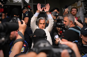 Calin Georgescu Raises Hands.png