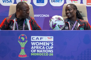 Lovemore Fazili, head coach, and his star player Tabita Chawinga Lovemore Fazili, head coach, and his star player Tabita Chawinga