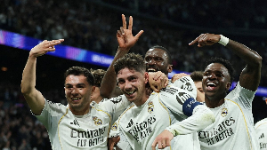 Real Madrid players celebrating a goal against Manchester City