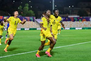 Some Black Queens players celebrating a goal