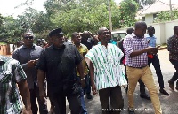 Koku Anyidoho [in black] with NDC bigwigs walking to the CID headquarters, Tuesday