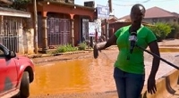 Women critising government about poor nature of roads