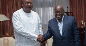 President Nana Addo Dankwa Akufo-Addo in a handshake with Former President Mahama