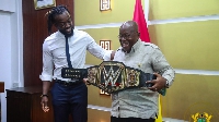 Ghanaian-American professional wrestler, Kofi Kingston and president Akufo-Addo (R)